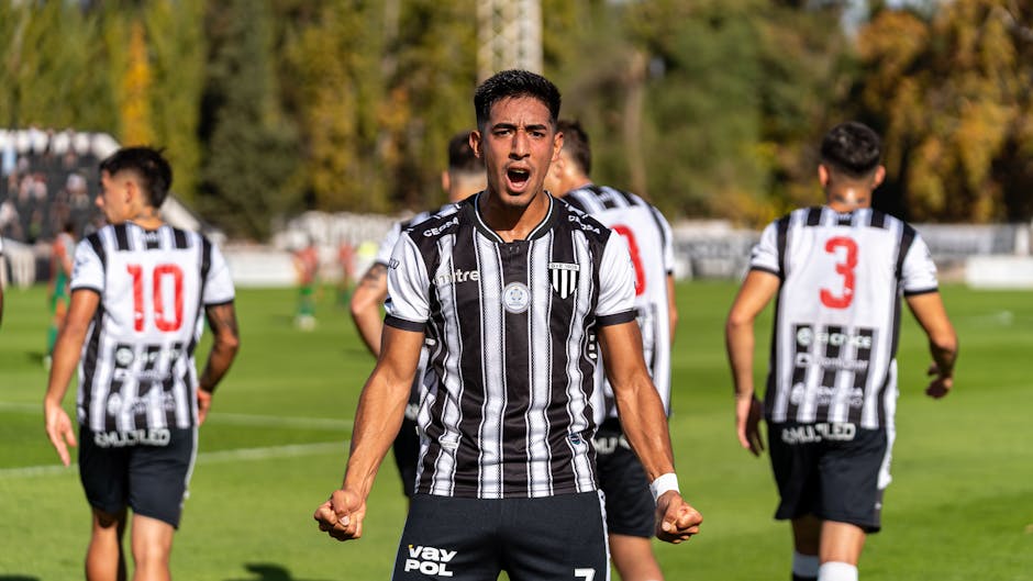 Active footballer celebrating vitality